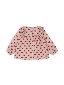 Blouse rose à coeur rouge